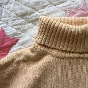 Yellow knit turtleneck sweater